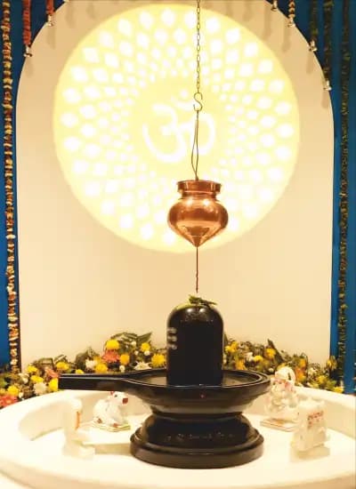 Jalabhishek ritual being performed on Shivling
