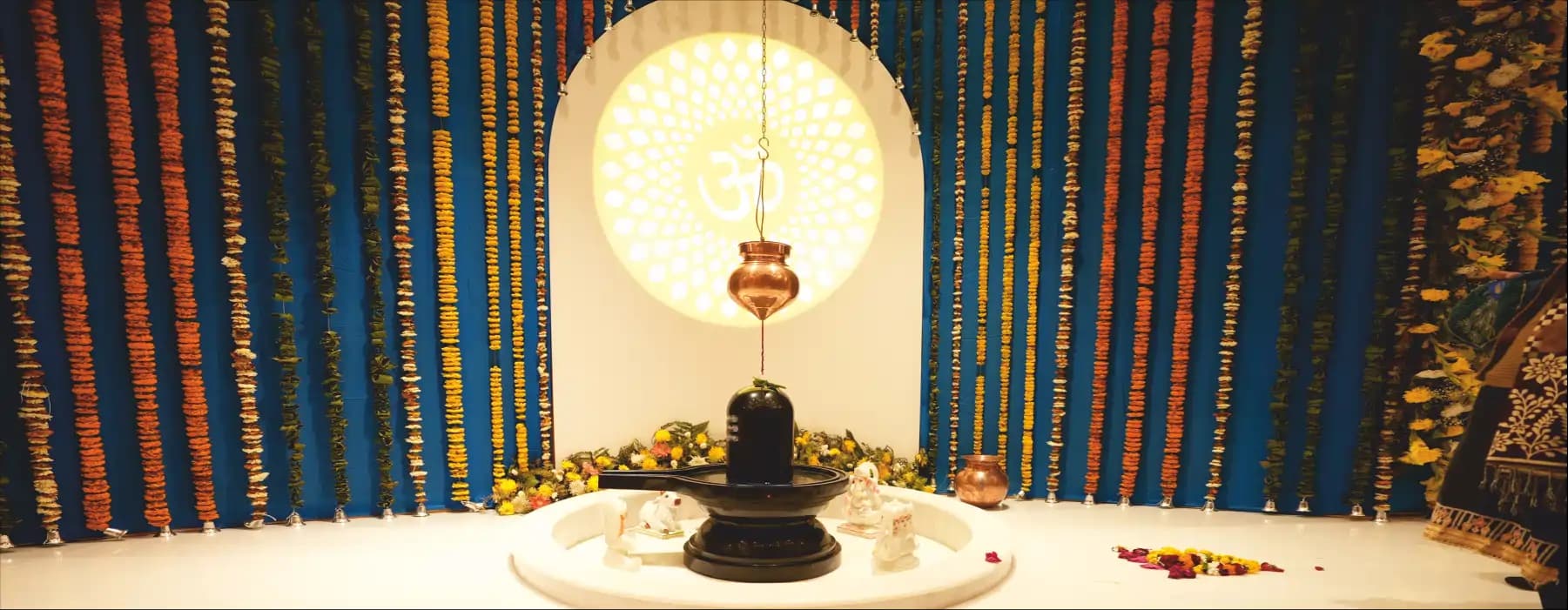 Jalabhishek ritual being performed on Shivling