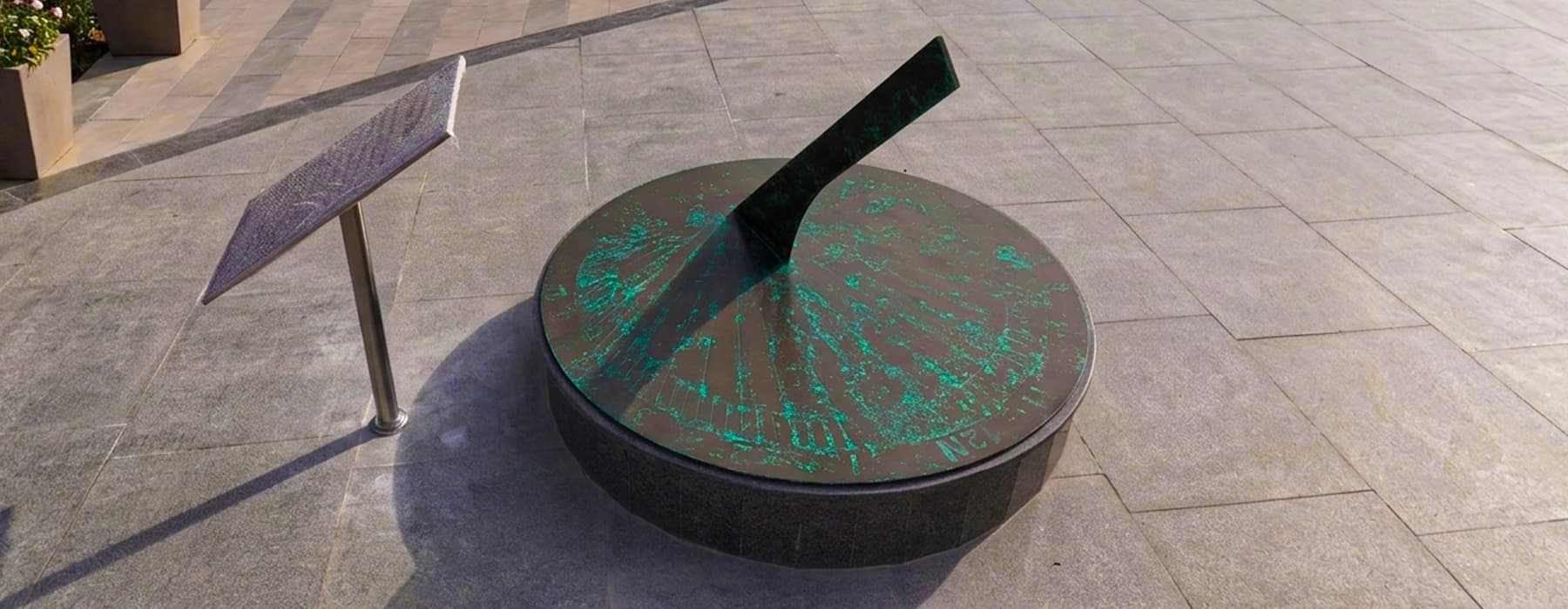 Sun Dial at Chaar Dham Temple Vrindavan, an ancient time measuring instrument on display.